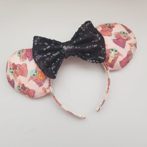 Grogu snacks Minnie ears